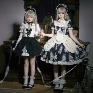 Twin vintage doll print lolita OP dress collection in black and beige - full body front view of two blonde lolita models wearing coordinated dresses with ruffled trims and bow decorations in vintage-inspired indoor setting