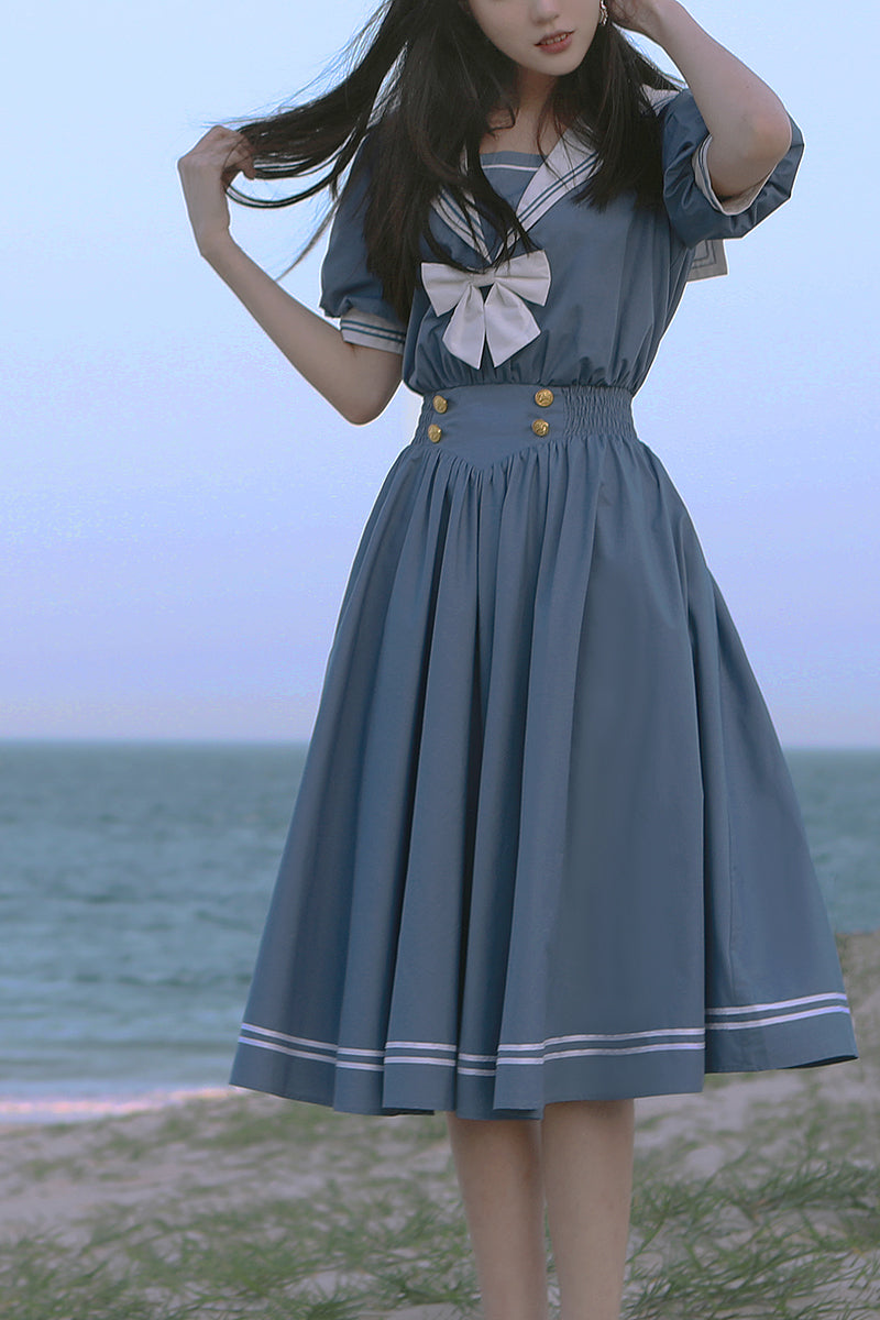 Dusty blue sailor lolita OP dress full body front standing posture female model seaside beach landscape authentic lolita fashion