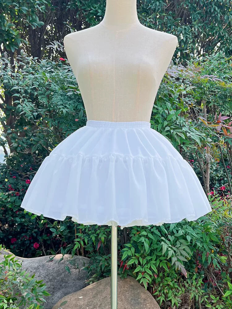 White adjustable lolita hoop petticoat front full view display mannequin outdoor garden setting voluminous ruffled skirt