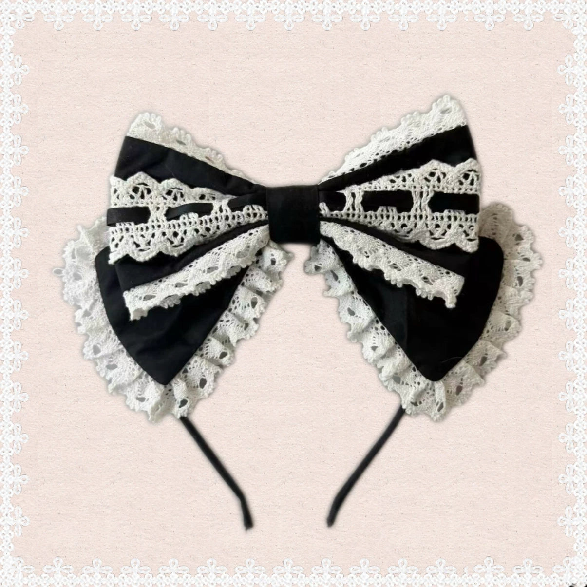 Detailed view of black lolita knee cushion or KC accessory piece showing cushioning construction and fit compatibility with Old School OP dress styling