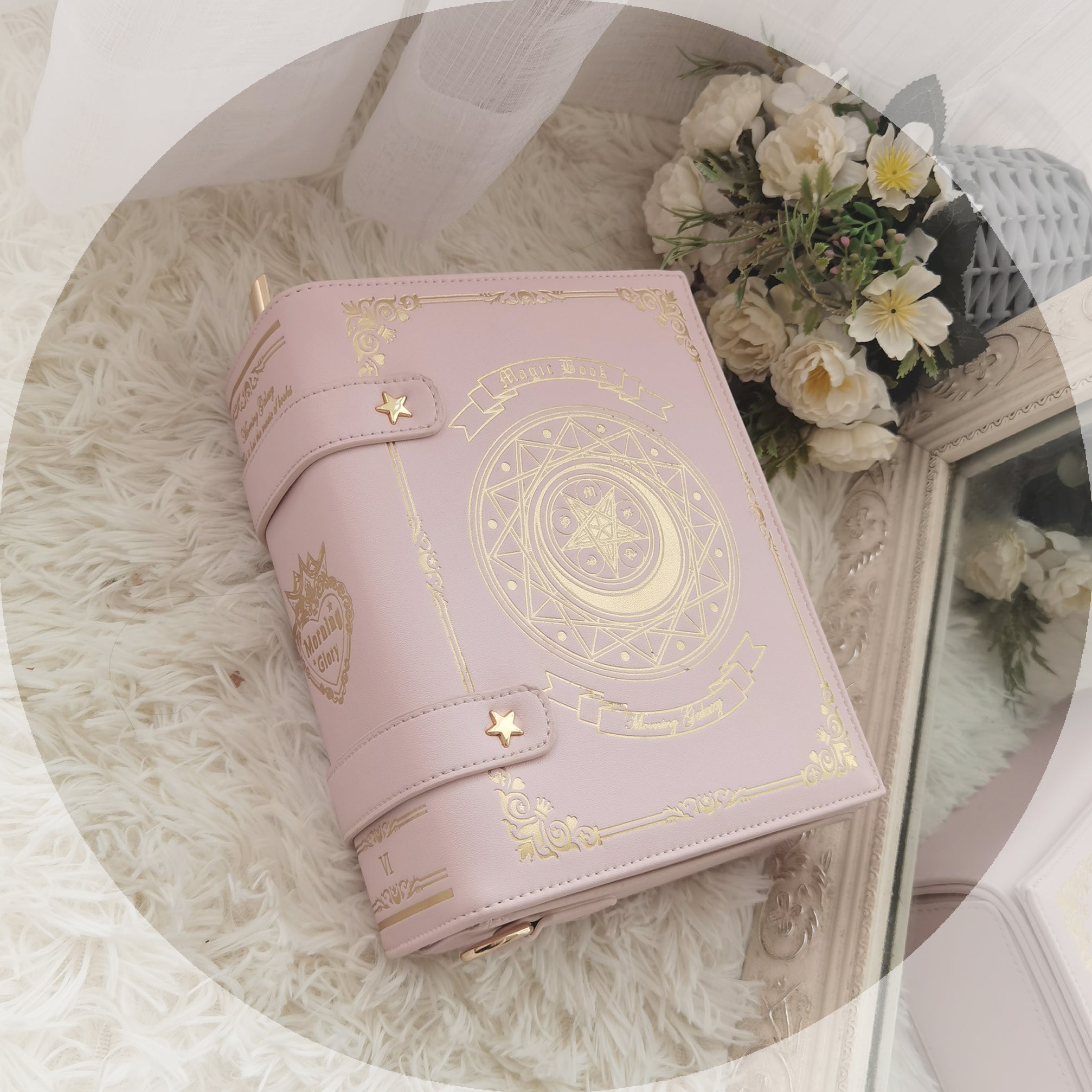Pastel pink magic book lolita crossbody bag flat lay front view with complete gold foil magic circle print and star-shaped buckle closures