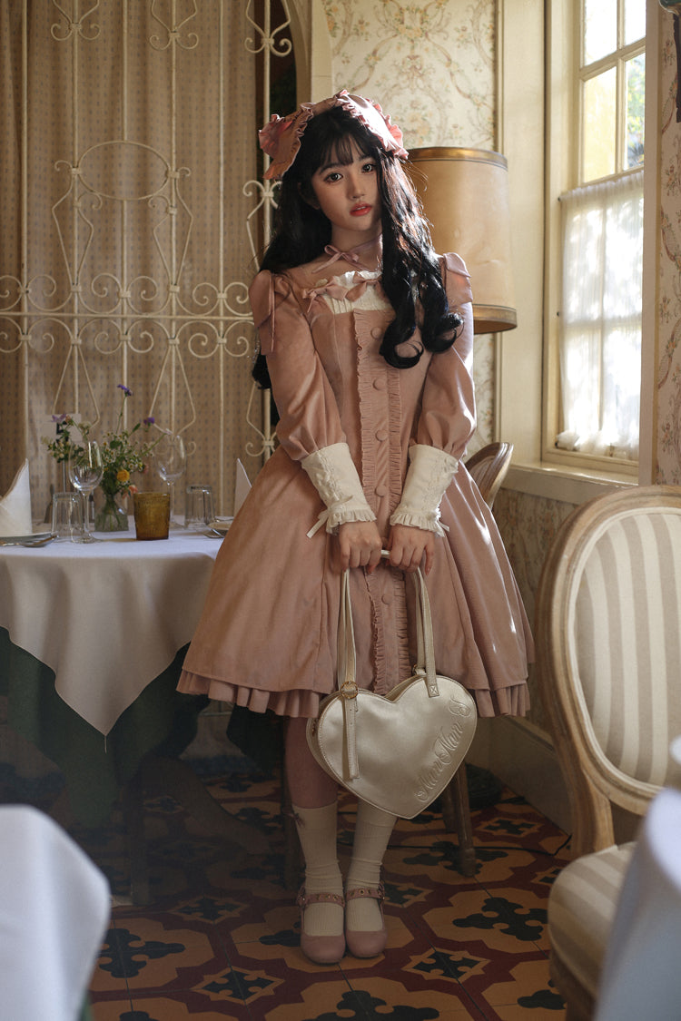 Velvet Lolita OP dress photography in flattering indoor studio lighting showcasing rich velvet nap texture, color depth, and photoshoot-ready aesthetic qualities for convention documentation