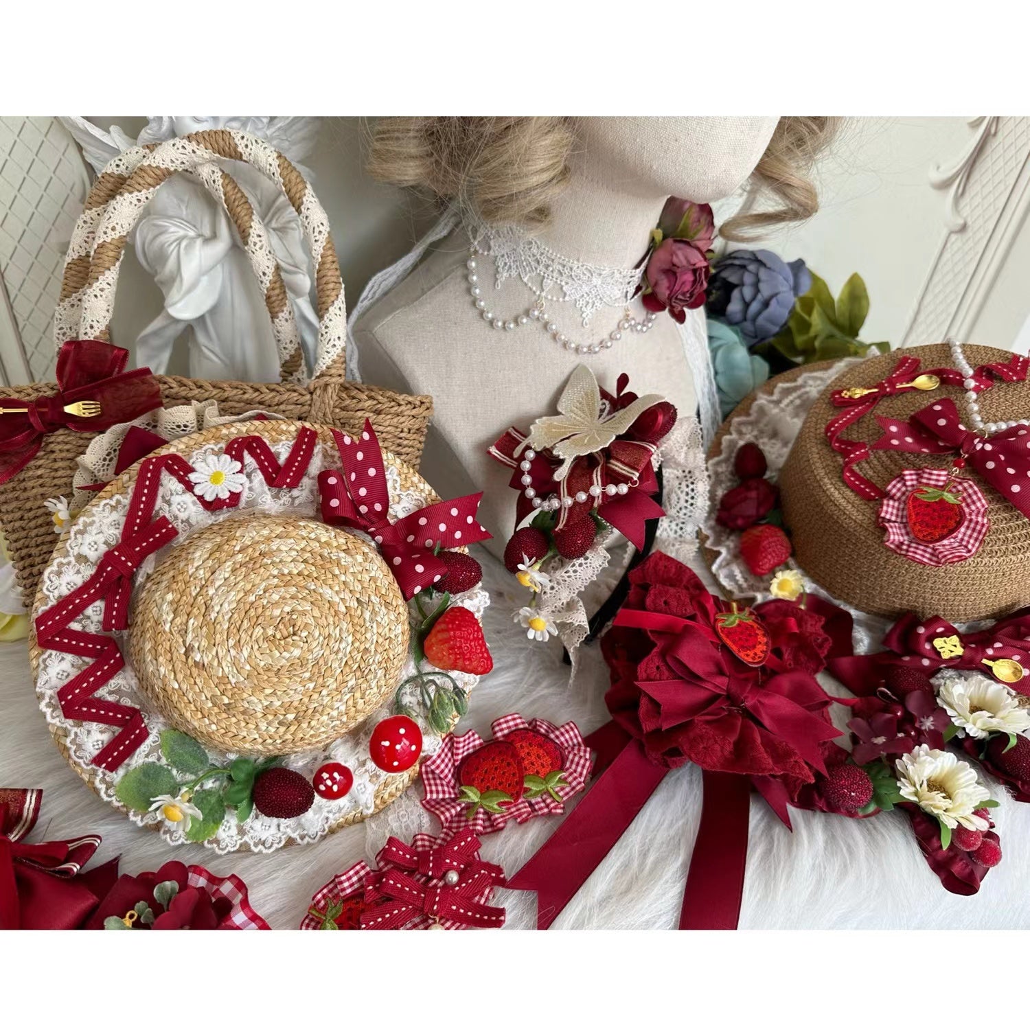Pastoral Lolita handmade woven straw hats and wicker bags with wine red ribbons and strawberry decorations on European vintage background