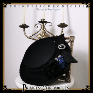 Black and blue gothic Ouji lolita top hat front view with fabric rose decorations silver brooch and black satin bow handmade twill flannel flat-top hat
