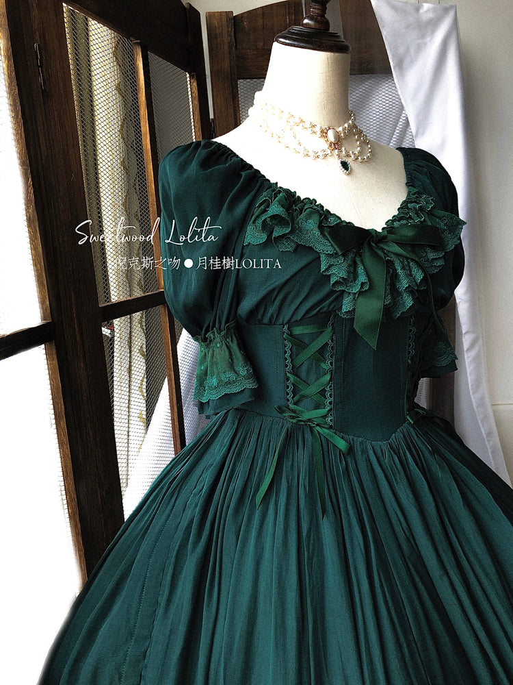 Dark green French Lolita OP dress with square neck puff sleeves and bow lace trim, half-body dress form view with pearl necklace in vintage window setting