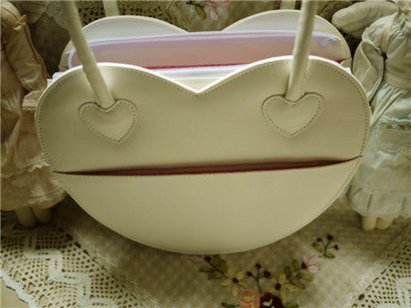 Cream white off-white heart-shaped Lolita tote bag rear view with heart embossed details flat back panel