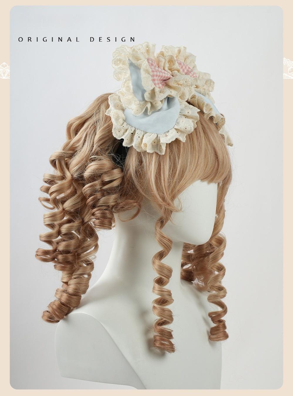 Mini cake top hat sweet lolita hair piece with rounded dome shape, light blue fabric base, pink gingham trim, satin bow, and ruffled lace collar Victorian-inspired
