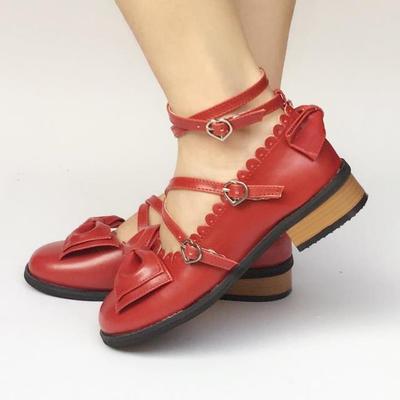 Normal glossy wine red lolita tea party shoe with lustrous finish, crossover strap, toe cap bow, and traditional low block heel