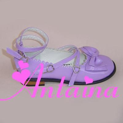 Shining purple iridescent lolita tea party shoe with lustrous metallic sheen, crossover buckle strap, delicate bow, and elegant silhouette