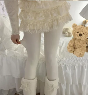 Full length back view of 300D thickened winter velvet lolita footed tights worn with fuzzy boots and ruffled lace skirt, cozy bedroom setting with teddy bear