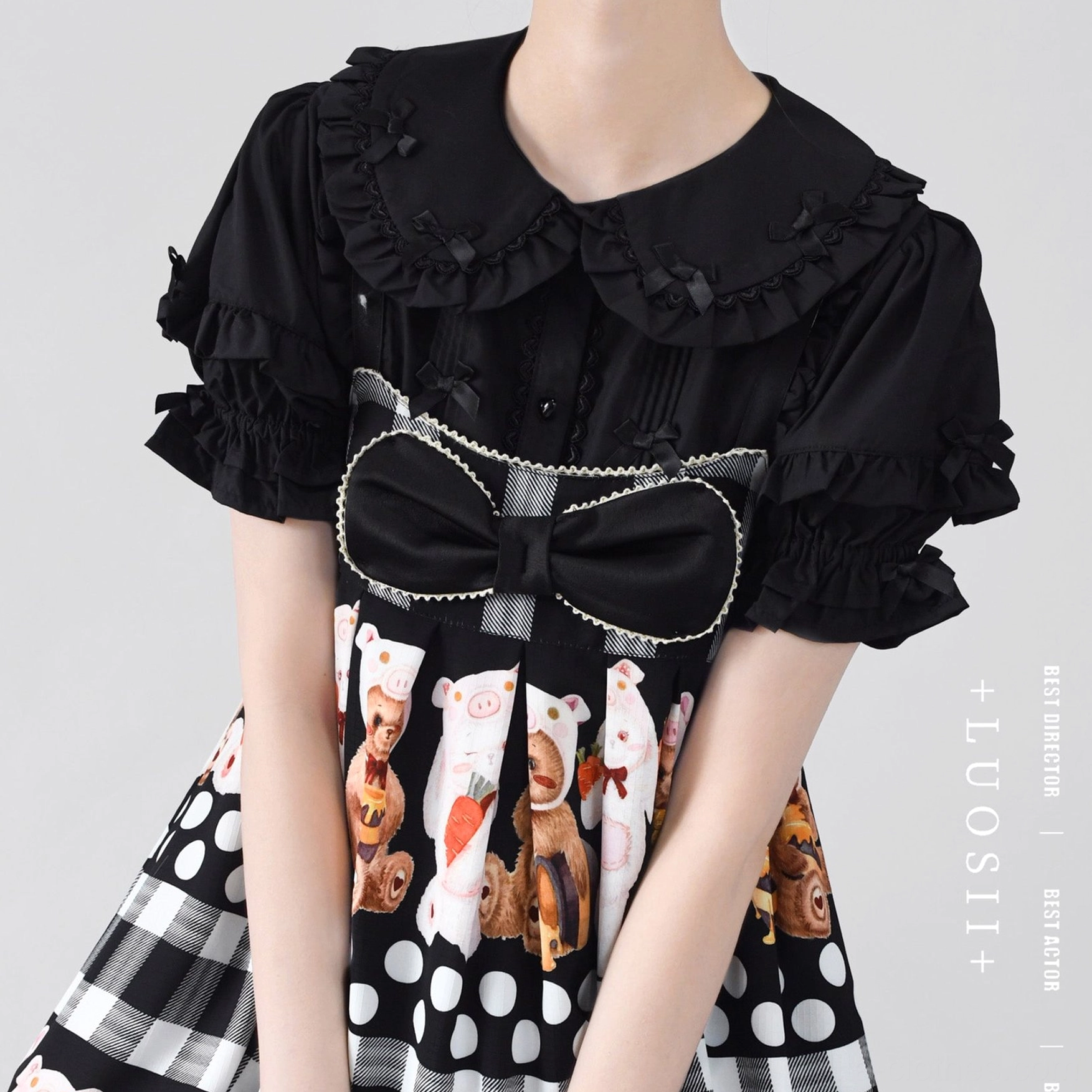 A-line lolita blouse front view showing pleated short sleeves false bib design and symmetrical embroidery sweet aesthetic