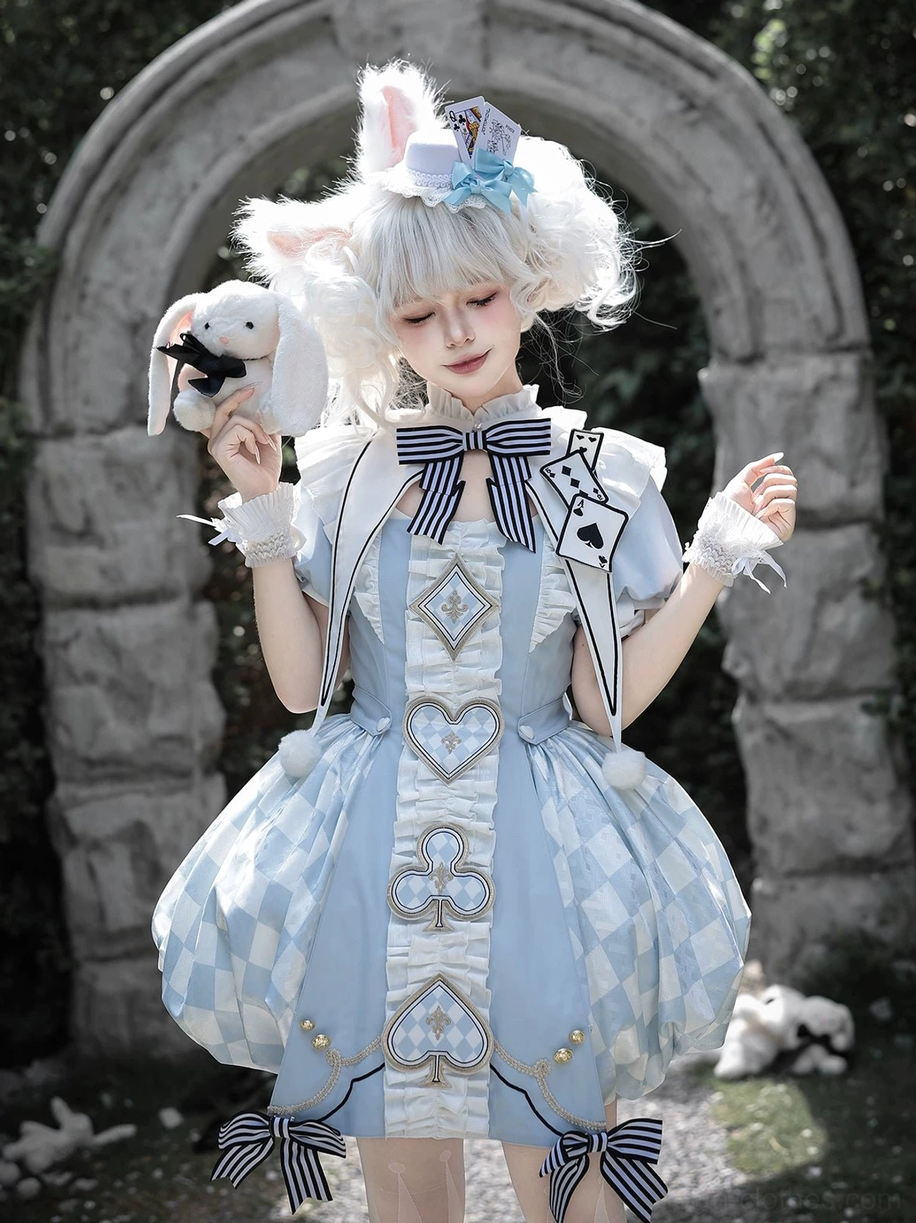 Single model wearing size S blue Alice Lolita OP dress in stone garden, model height 5'3 inch 160 cm weight 101.41 lbs 46 kg, demonstrating fit and proportions