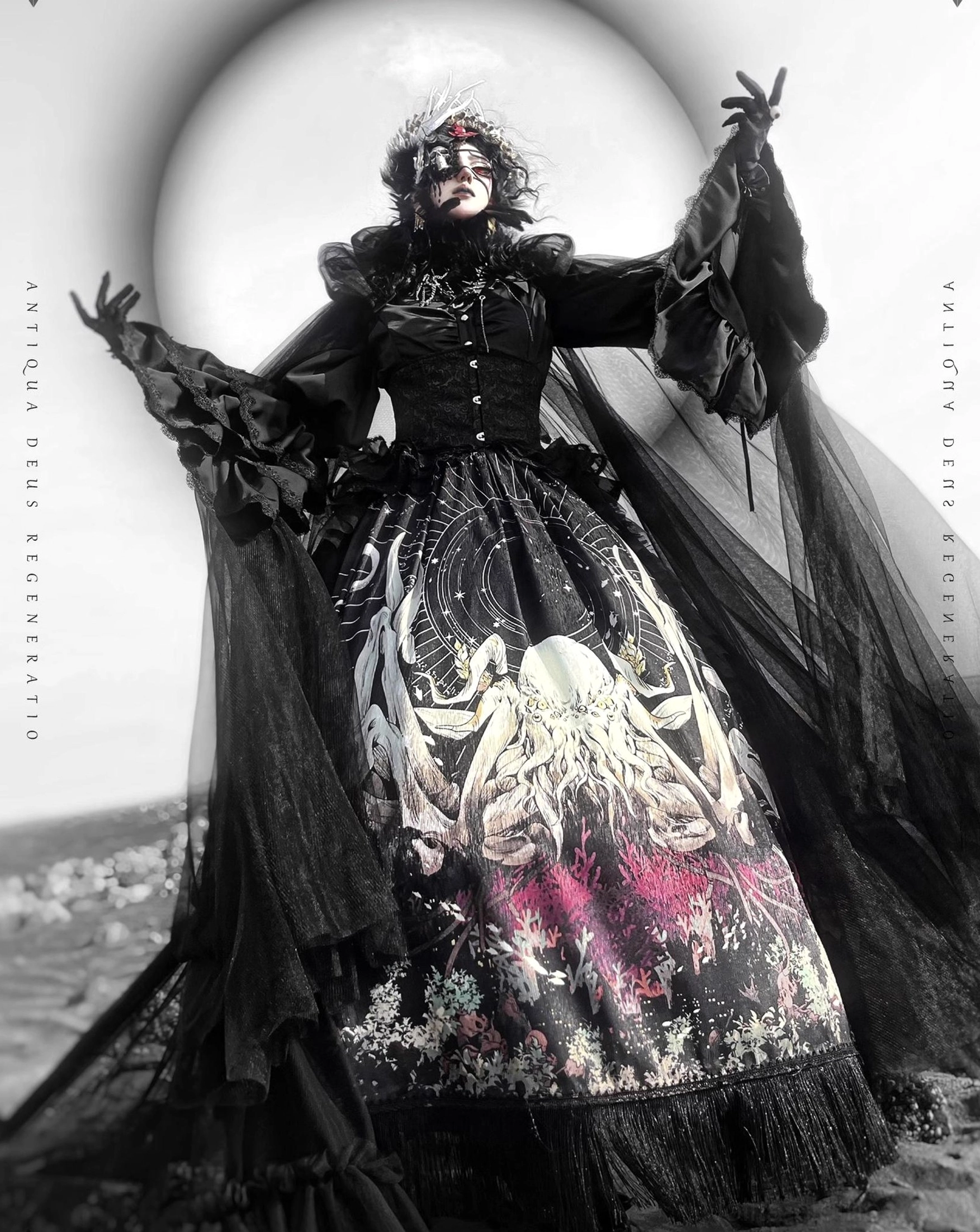 All-black monochrome Cthulhu Gothic Lolita ensemble front three quarter view blindfold goggles ruffled gloves sheer black cape veil long tulle train