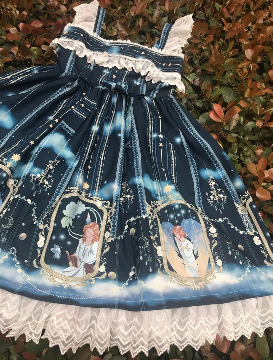 Complete view of angel-themed Lolita jumper skirt showing overall silhouette, color variation, and full design composition