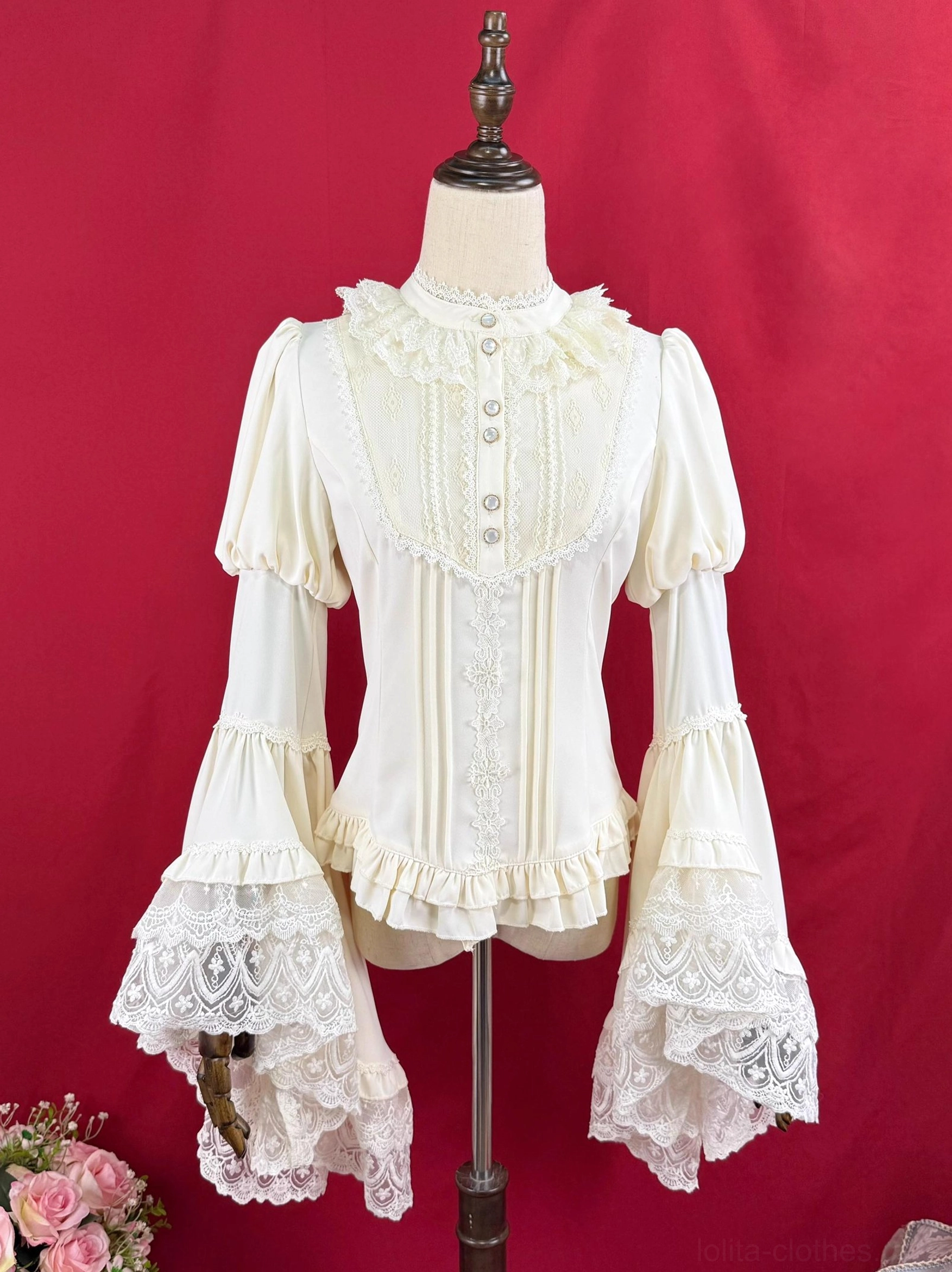Apricot cream Lolita blouse with ruffled stand collar fitted waist and lace-trimmed trumpet sleeves front full length view