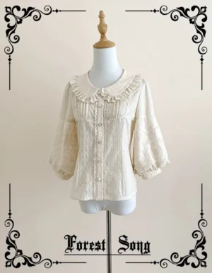 Apricot embroidered sweet lolita doll collar blouse with ruffled lace collar and half puff sleeves front view on dress form mannequin with vintage decorative frame