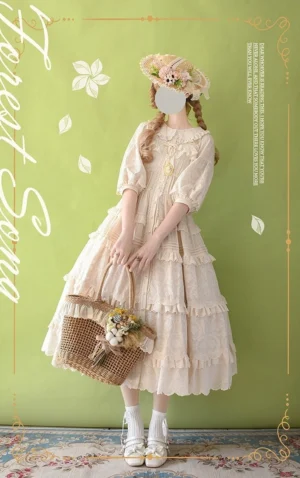 Sweet lolita fashion coordinate featuring apricot embroidered blouse paired with tiered ruffled skirt, straw boater hat, white knee-high socks and mary jane shoes in garden picnic styling