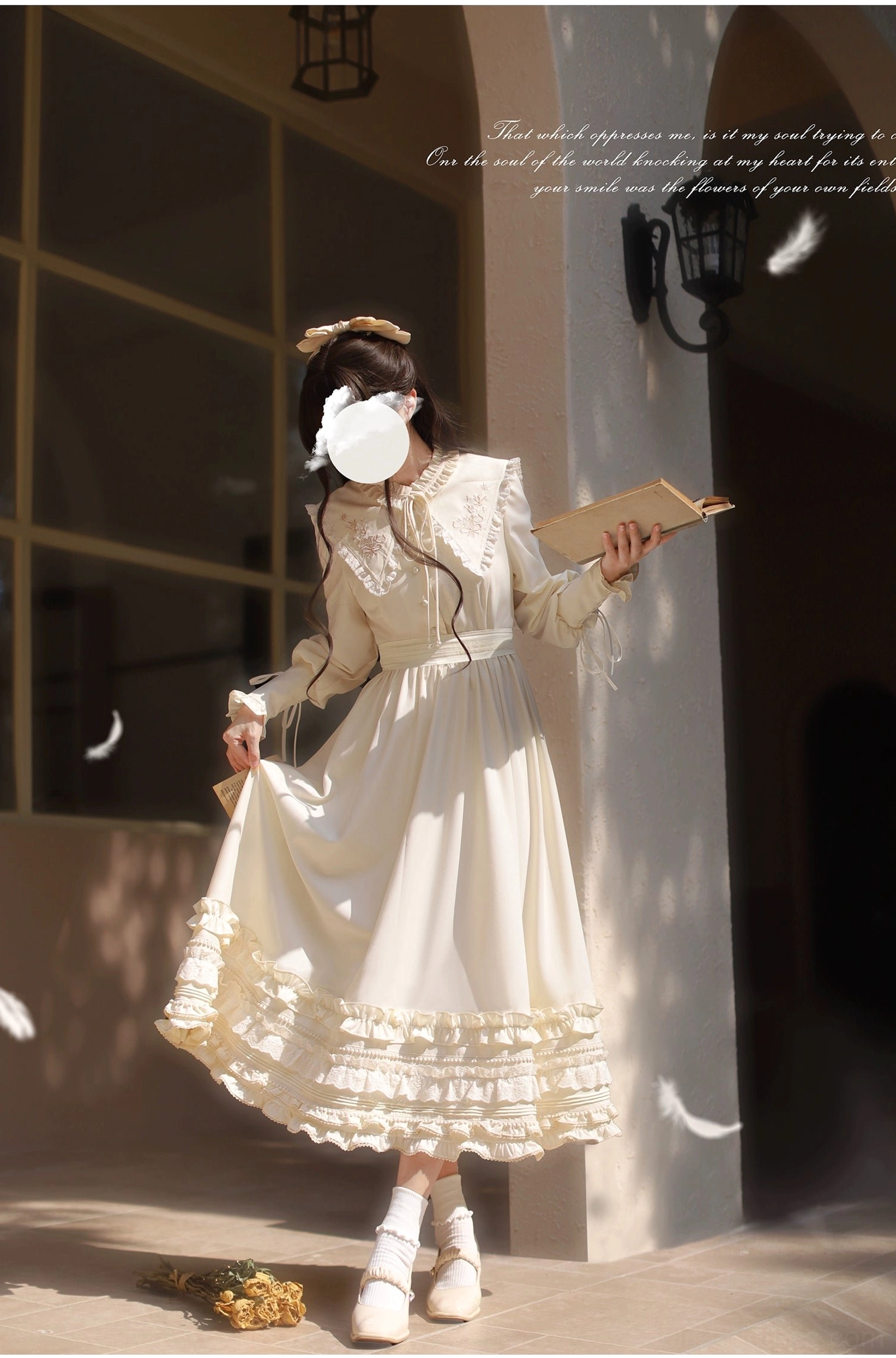 Three-quarter body view of apricot Lolita OP dress, lace yoke bodice, long bishop sleeves, ruffled skirt hem, model holding vintage book in period setting