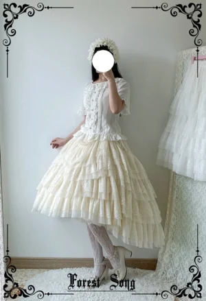 Apricot beige lolita petticoat front three-quarter angle on model with floral hair accessory displaying soft layered tulle ruffles and romantic silhouette