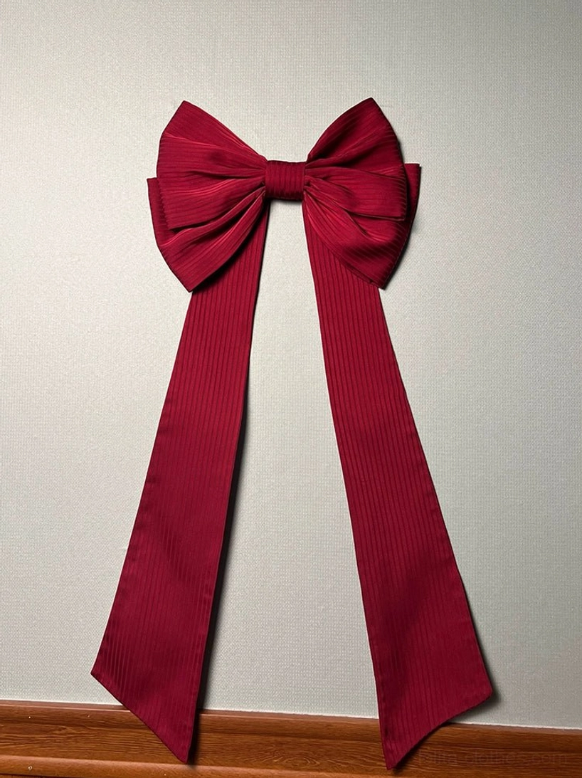Wine red arrogant miss trailing bow with long cascading ribbons sweet lolita fashion accessory detailed view