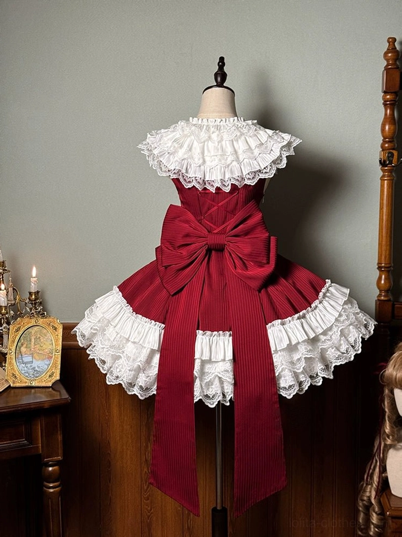 Wine red off-shoulder sweet lolita short dress with oversized back bow and long trailing ribbons on dress form