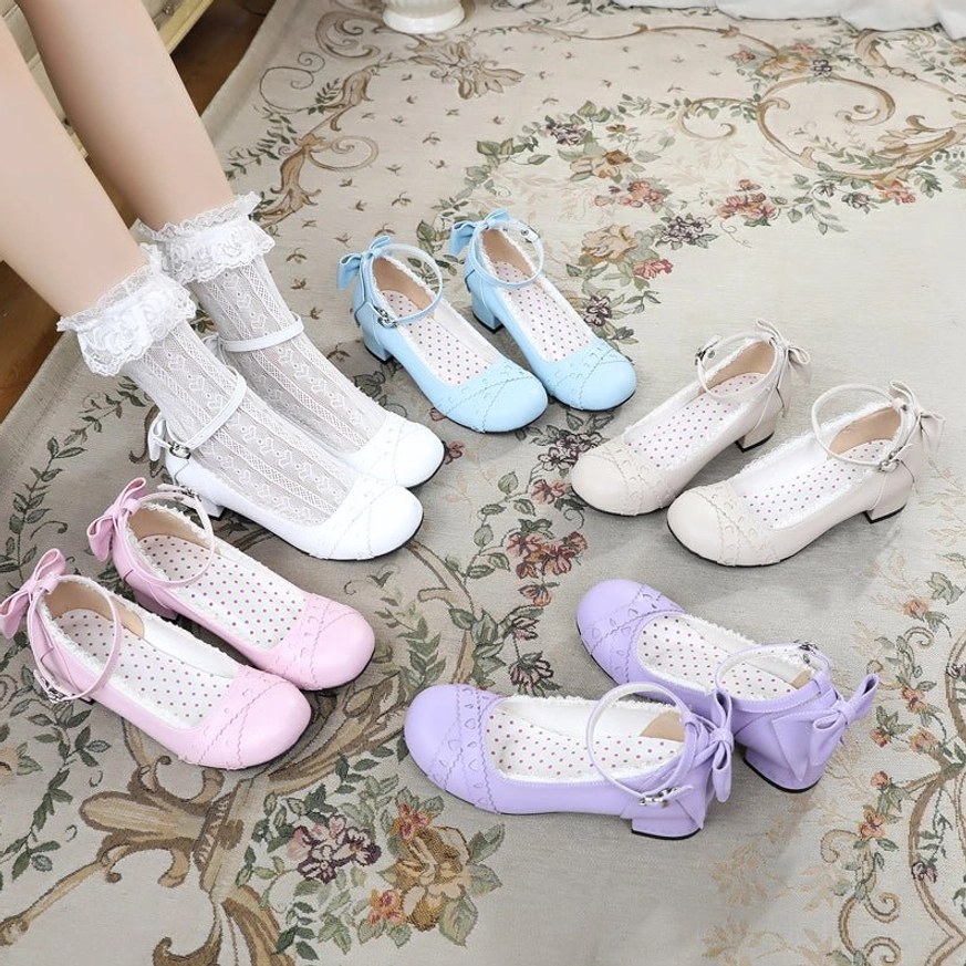 Assorted pastel color sweet lolita Mary Jane round toe flat shoes flat lay display showing light pink, light purple, cream white, and sky blue variations with matching ruffled lace socks