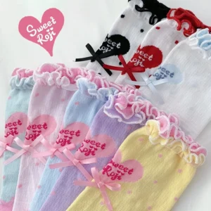 Assorted sweet Lolita short socks collection flat lay multiple pastel colors pink bow heart print ruffled frilled cuff white background