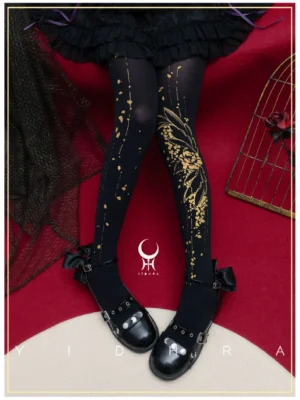 120D semi-opaque asymmetric herb and gold print Lolita pantyhose on black base paired with black ruffled skirt and vintage Mary Jane heels in decorative studio backdrop