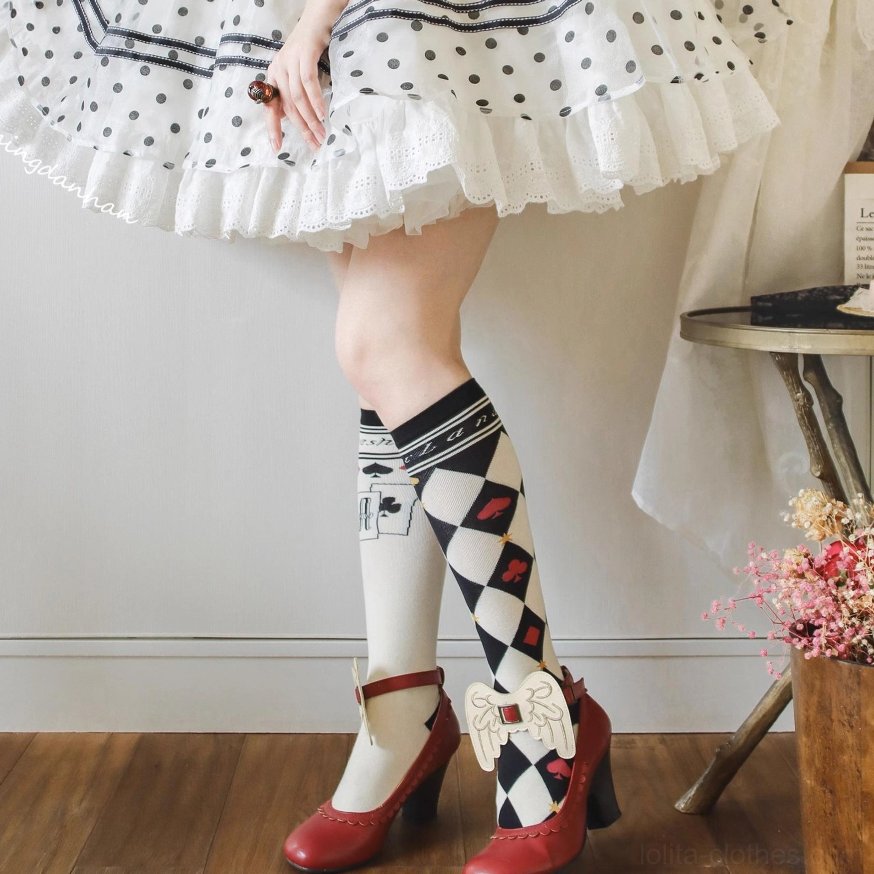 Asymmetrical poker print lolita cotton mid-calf socks worn with classic Alice maid dress Mary Jane shoes indoor photoshoot