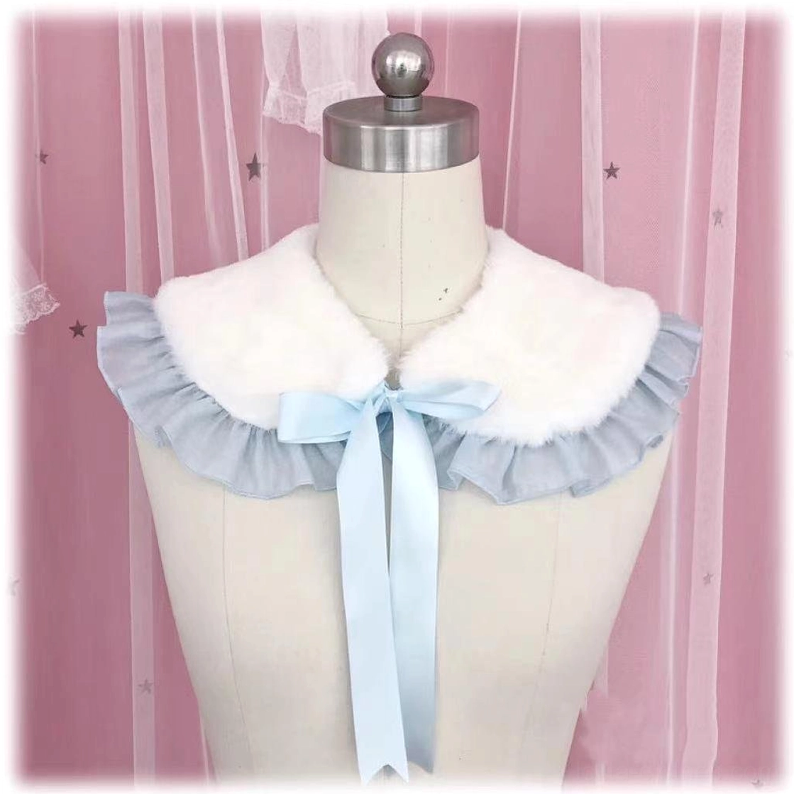 Baby blue lotus leaf edge Sweet Lolita fluffy false collar scarf with light blue satin bow displayed on a dress form
