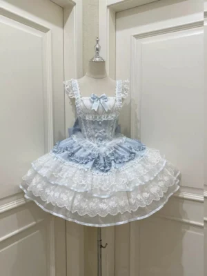Front view of baby blue sweet lolita JSK dress featuring ruffled square neckline, delicate satin bow at bust, multi-layered lace ruffled petal-style skirt on dress form