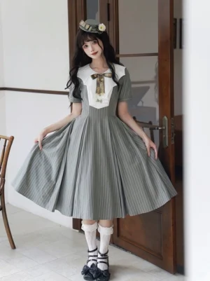 Bean green-grey striped classic lolita OP dress with bat wing collar front view full-body shot featuring white sailor collar bow tie and puff sleeves on model indoors