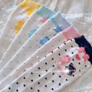 Assorted bear and bunny lolita calf socks collection in pastel colors with polka dot patterns and cute cartoon prints displayed flat lay