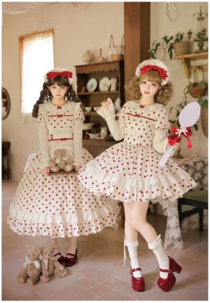 Vintage beige polka dot Old School lolita OP dress front three-quarter view cream burgundy dots ruffled skirt hem two models retro tea house aesthetic
