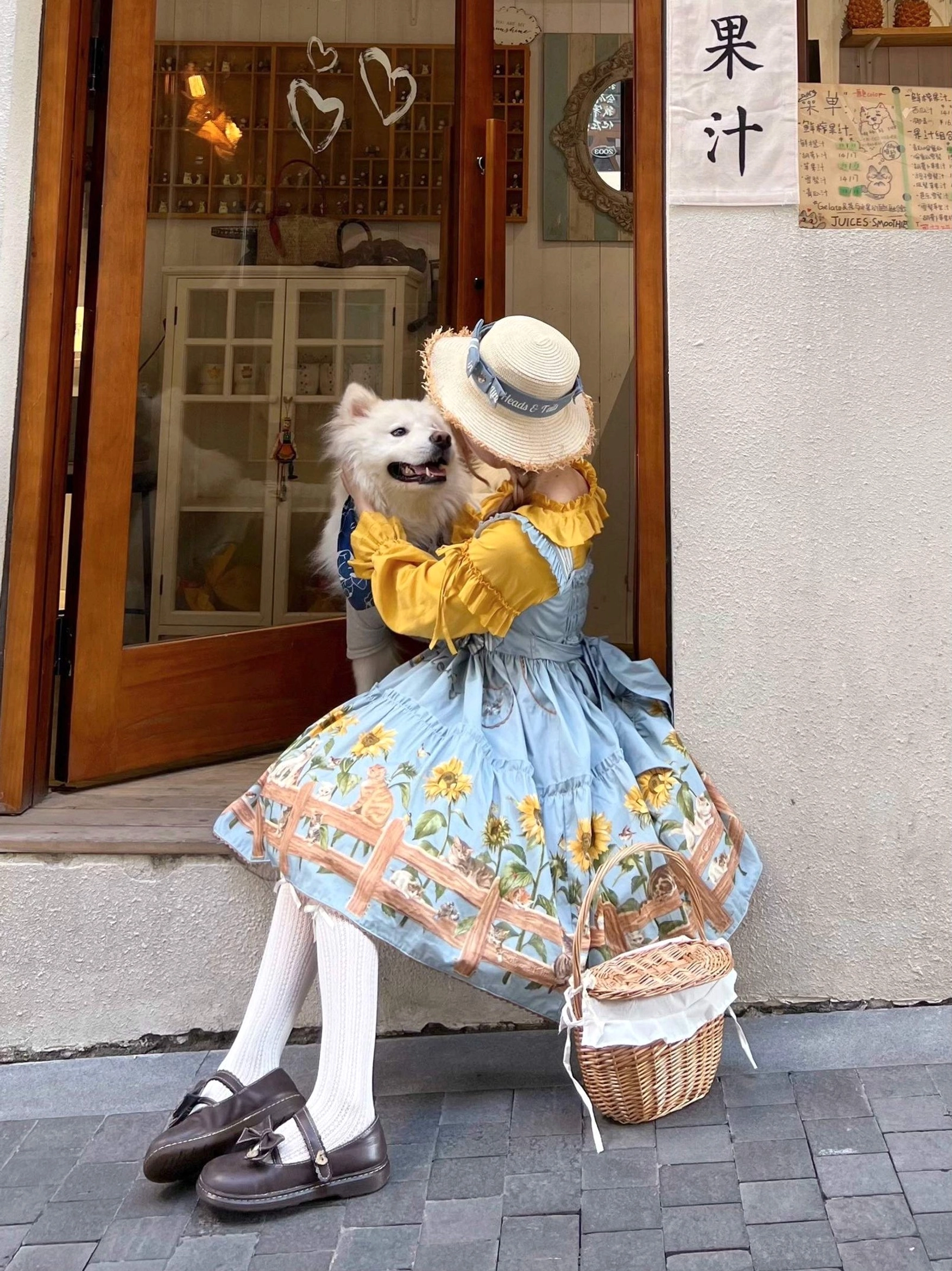 Product display of beige country lolita JSK dress showing A-line silhouette tiered hem and adjustable shoulder straps