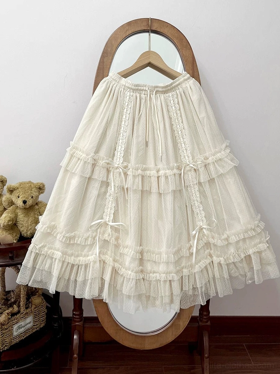 Cream beige lolita petticoat with warm tone multi-layer tulle ruffles and satin ribbon details, displayed on vintage wooden hanger showing drawstring waist system