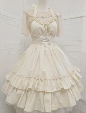 Beige Classic Lolita halter neck JSK dress with short flutter sleeves, ruffled lace neckline, waist lace-up corset detail, and double-tiered ruffled flared skirt displayed on dress mannequin with white panel wall background