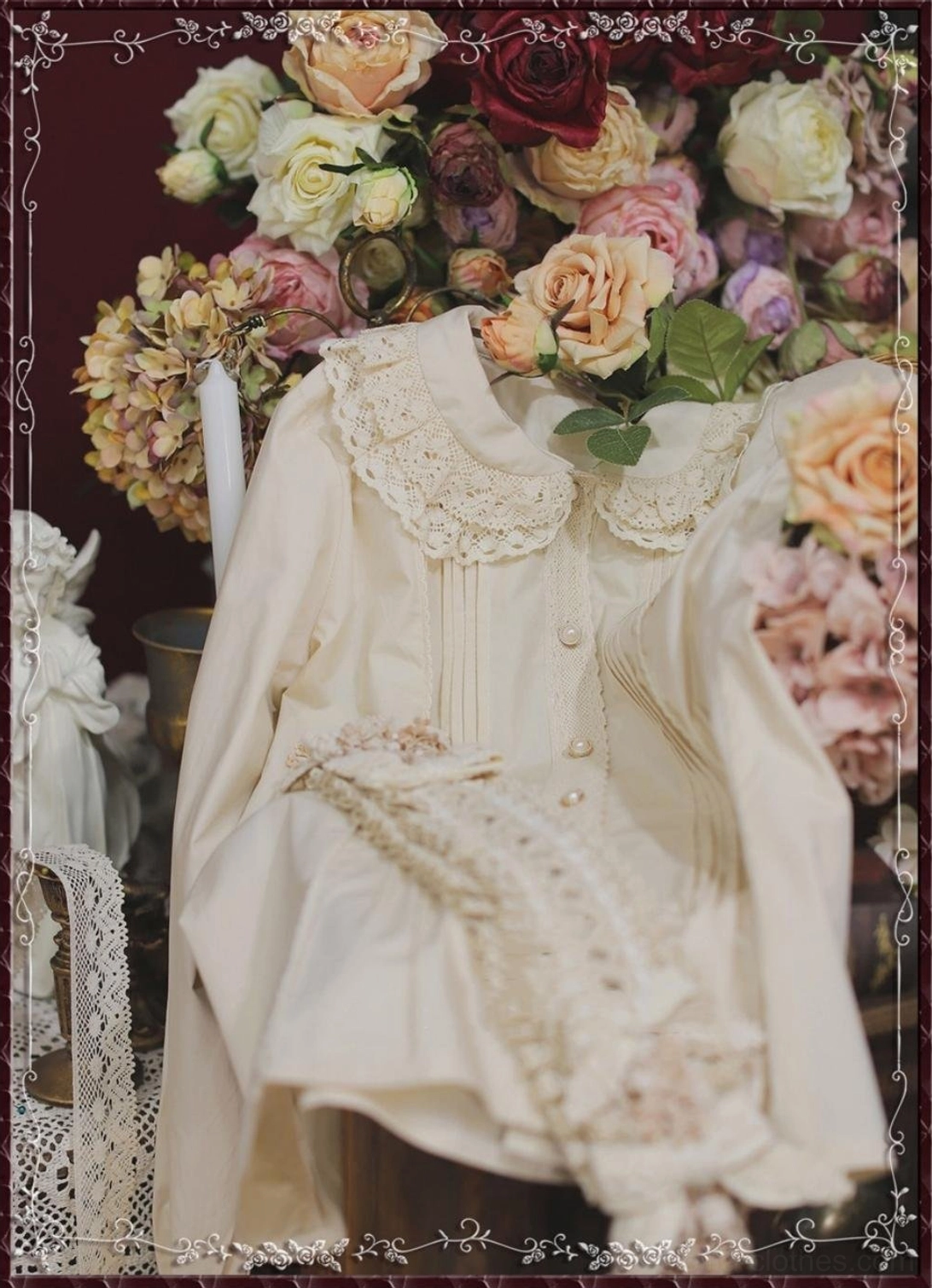 Beige vintage embossed lace Peter Pan collar cotton Lolita blouse flat lay angled view with front pin tuck pleats and decorative lace panel