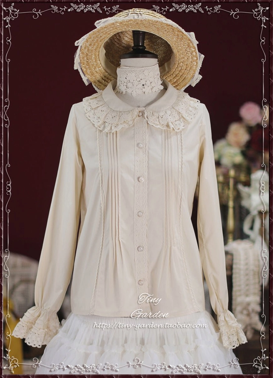 Beige vintage lace Peter Pan collar cotton Lolita blouse frontal flat lay view with brand text showing lace collar and button placket