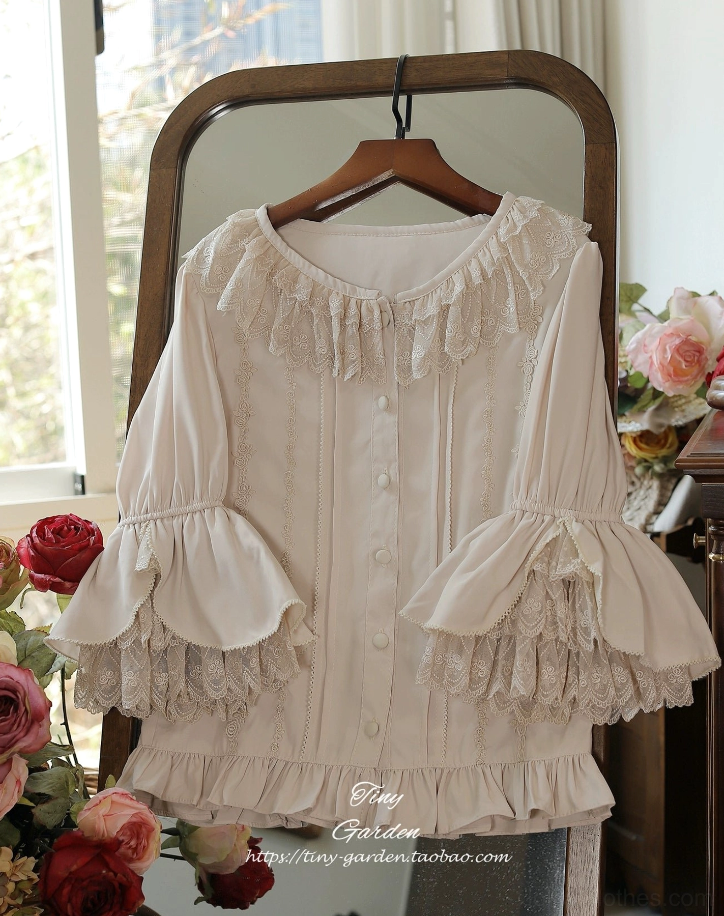 Beige vintage ruffled lolita blouse with lace-trimmed ruffled collar and layered bell sleeves with lace, hanging front display retro aesthetic, front button closure and ruffled hem