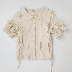 Beige ruffled short-sleeve Lolita blouse with Peter Pan collar, front button placket, side ruffled trims, adjustable drawstring hem, wrinkled cotton texture, front flat lay view
