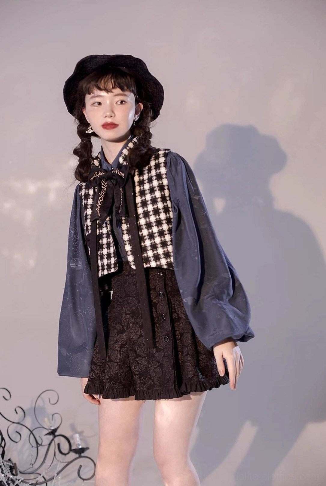 Classic sweet Lolita coordinate styling featuring beige vintage blouse with high-waisted pleated pastel skirt Mary Jane shoes and delicate hair accessories