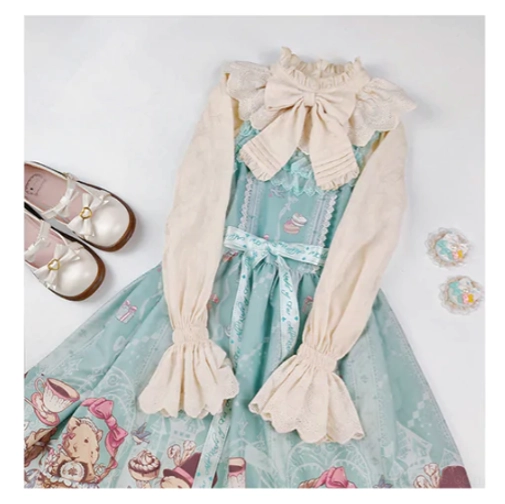 Beige lolita cotton blouse paired with mint green printed lolita jumpskirt mary jane shoes and tea-party themed brooches vintage sweet coordinate styling