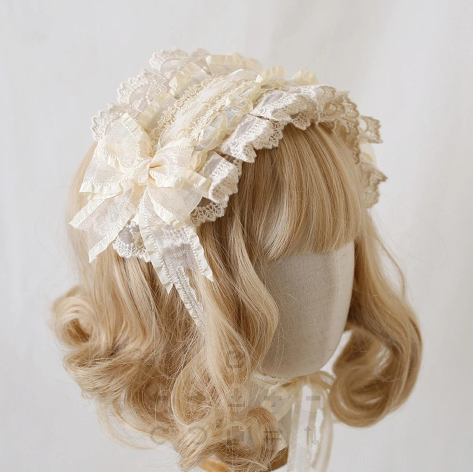 Beige lolita lace hair clip headband rear side view showing multi-layer ruffled lace, large side bow decoration, and elegant vintage lolita style design