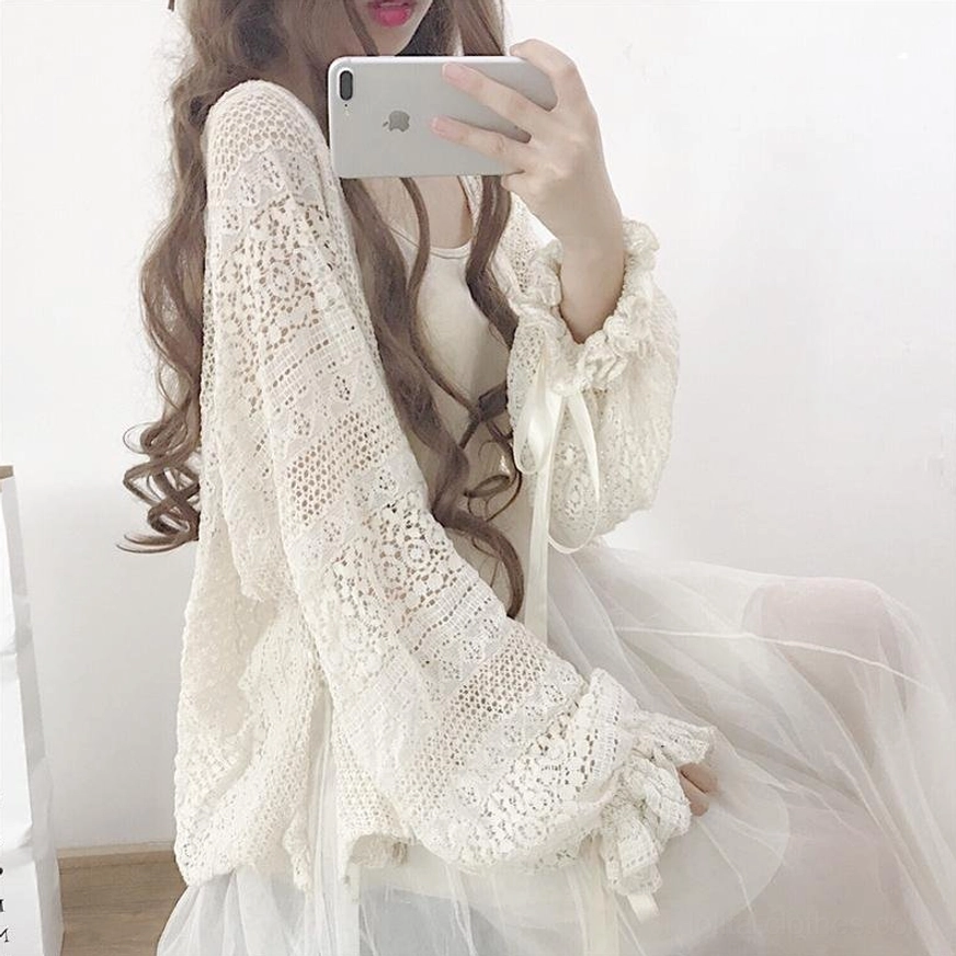 Beige oversized lolita cardigan with crocheted hollow texture and lantern sleeves perfect for pairing with tulle slip dresses and lolita skirts
