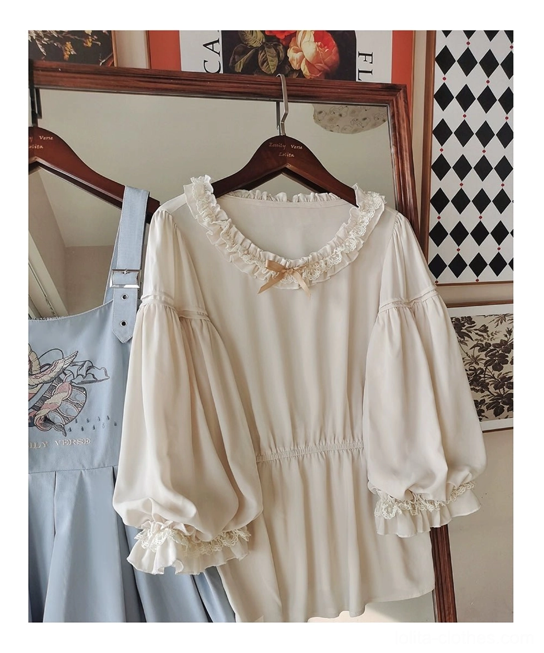Hanging beige ruffled inner blouse and sky-blue Lolita JSK dress side display view clothing rack checkered retro wall background bird embroidery drawstring waist