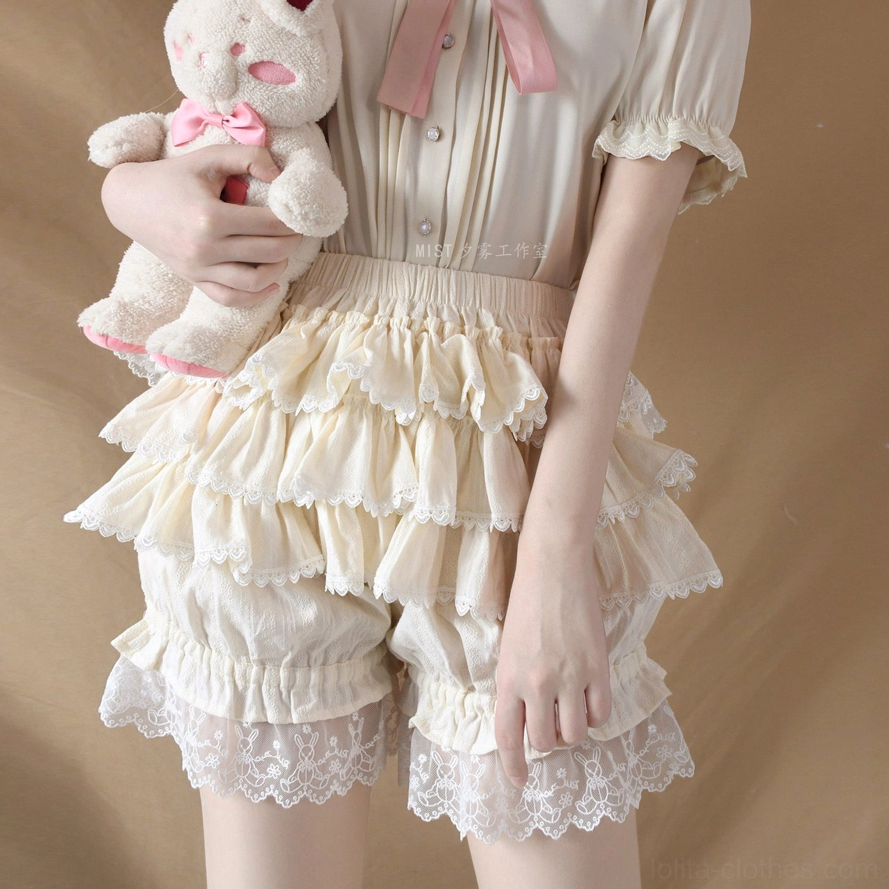 Beige sweet lolita bloomers full-body styled coordinate featuring matching blouse, thigh-high socks, and lolita accessories for complete sweet lolita fashion look