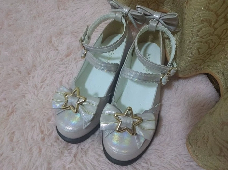 Beige sweet lolita shoes with sun-reactive glitter effect star gold ornaments double ruffled ankle straps heart-shaped buckles and low heel for tea party coordinates