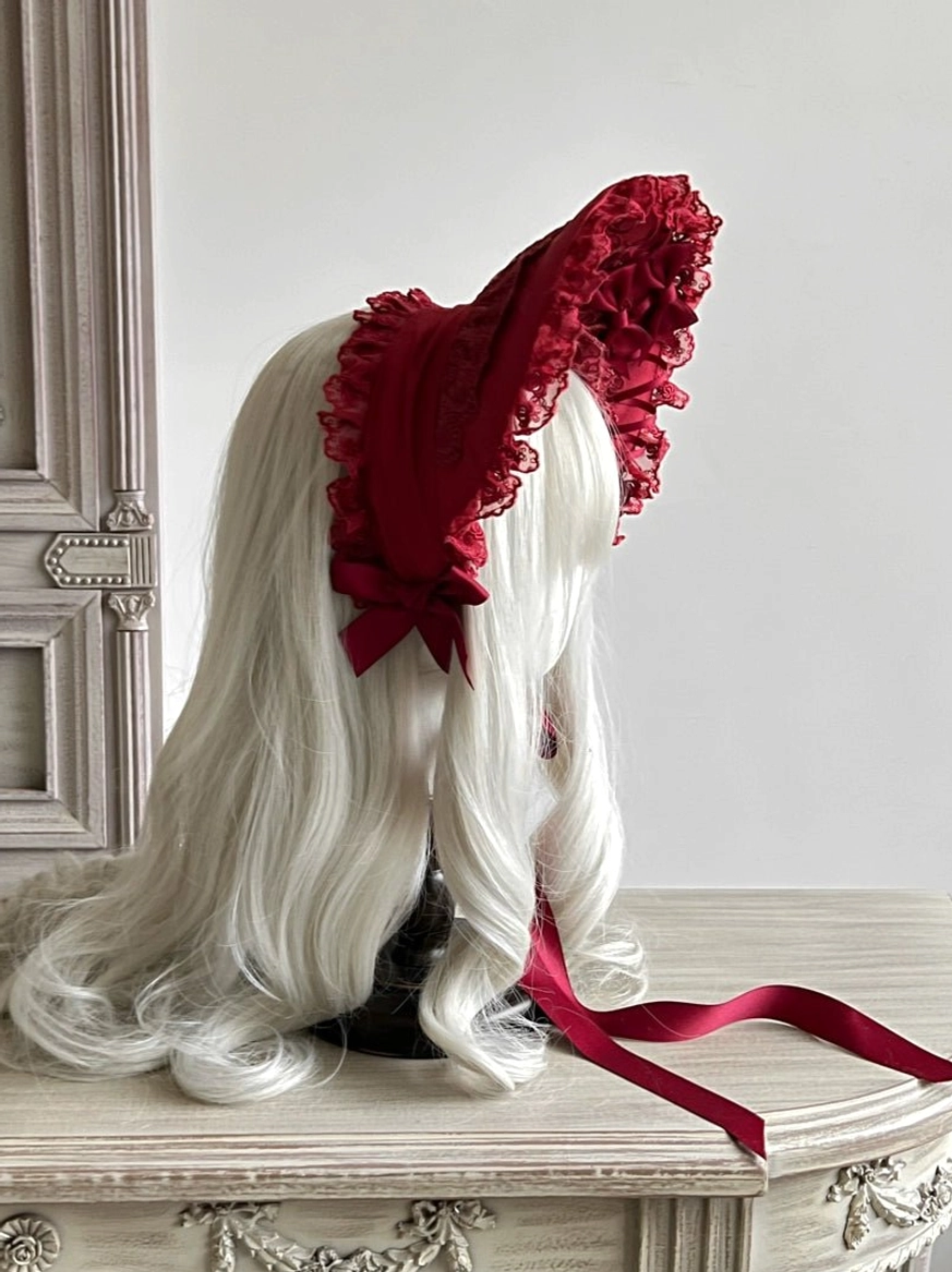 Black and white gothic lolita lace bonnet contrast design, adjustable chin straps, classic color combination for alternative styling