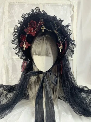 Black and burgundy gothic lolita bonnet front view with cross pendant chains lace frame and burgundy floral decorations